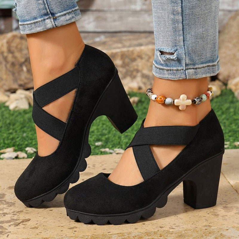 Zapatos Mary Jane de mujer con plataforma, tiras cruzadas y tacón alto.